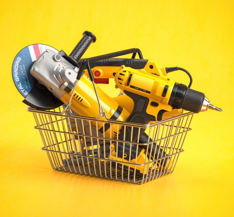 Shopping basket with elecric tools and construction equipment angle grinder, electric drill